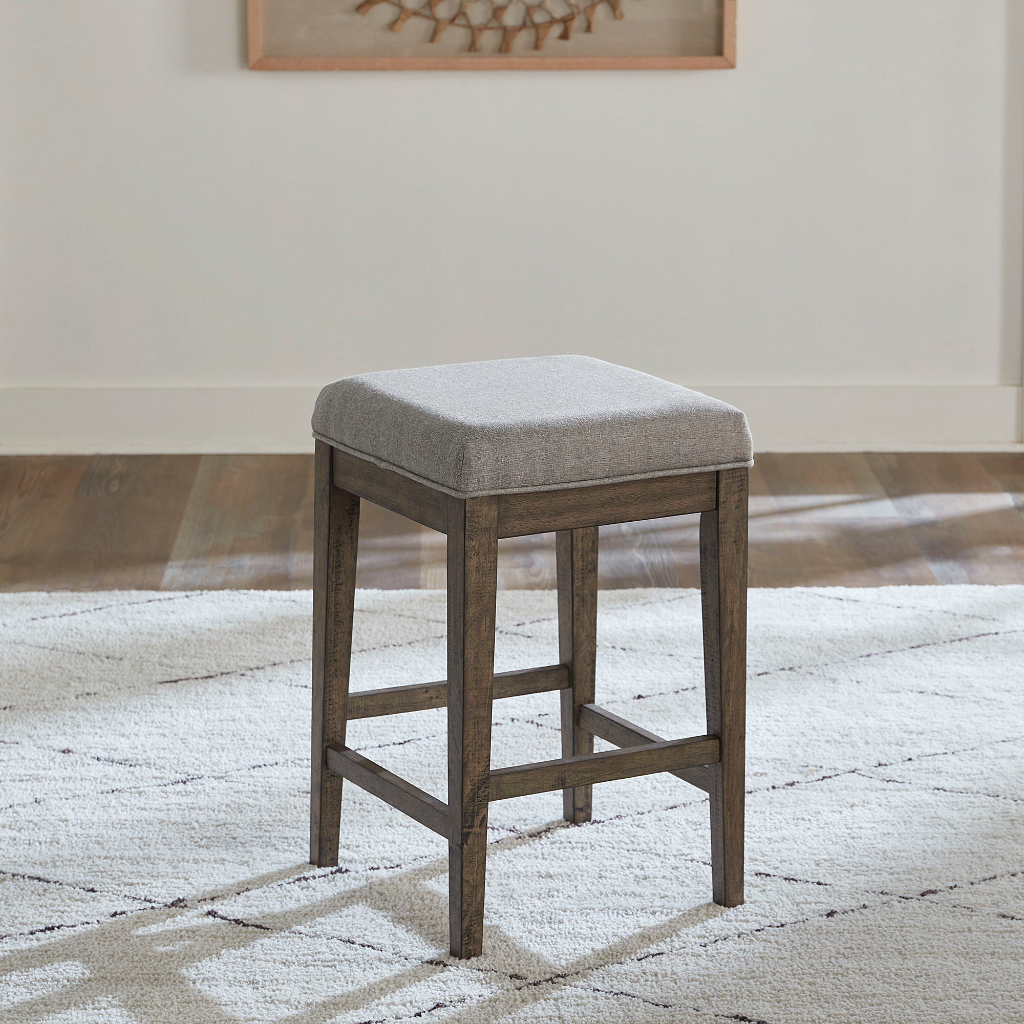Arrowcreek - Upholstered Console Stool - Weathered Stone